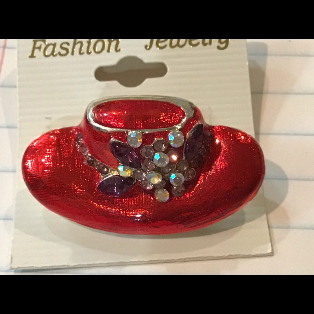 red hat with purple rhinestones silver pin